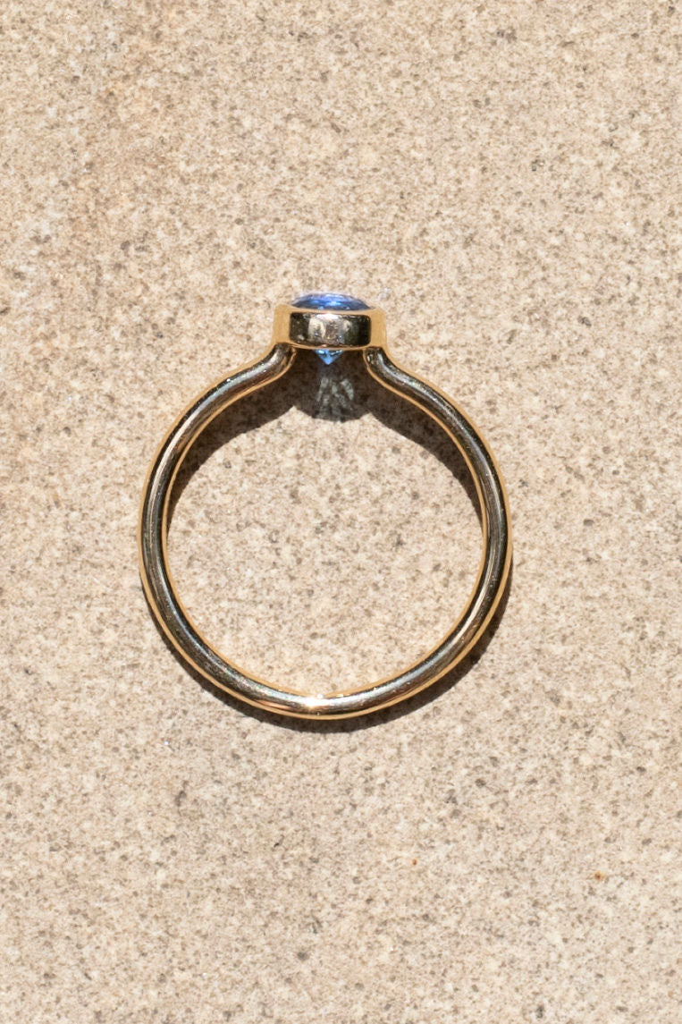 Empowered Solitaire Blue Topaz Ring